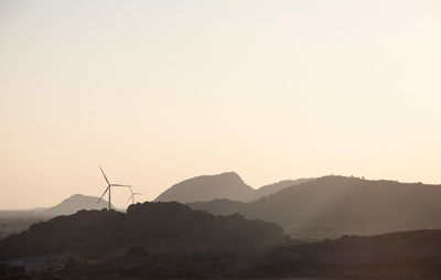 Scenic view of mountains against sky during sunset