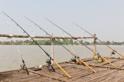 Fishing net on sea against clear sky