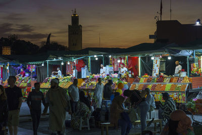 Group of people on street at night