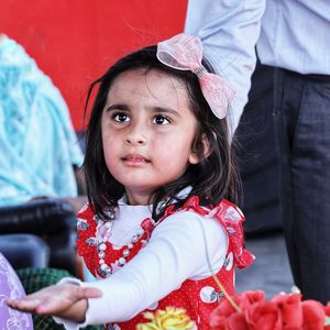 Portrait of cute girl looking away