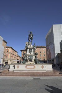 Statue of building against blue sky