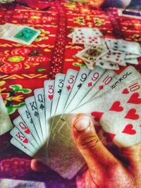 Close-up of hand playing with tattoo