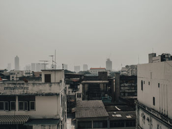High angle view of buildings against clear sky