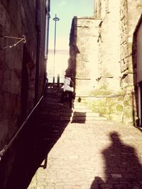 Shadow of building against sky