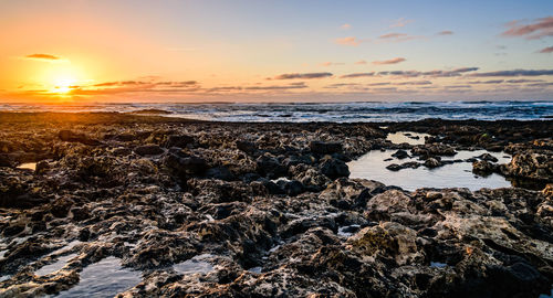 Scenic view of sea against sky during sunset