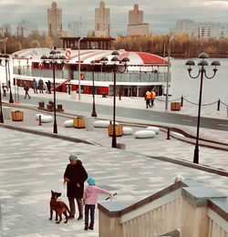 People walking on street in city