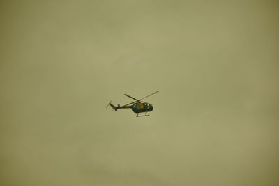 Low angle view of airplane in sky