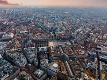 Aerial view of piazza duomo in front of the gothic cathedral in the center.