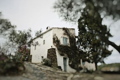 Low angle view of old building against sky