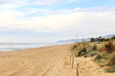 Scenic view of beach against sky