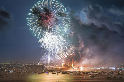 Firework display at night