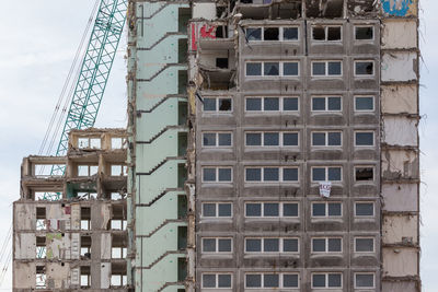 Tower block being demolished