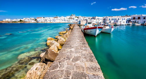 Scenic view of sea against blue sky