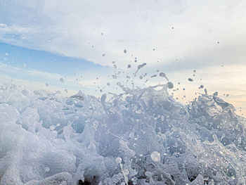 Scenic view of sea against sky during winter