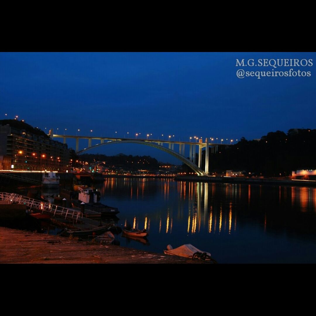 illuminated, night, water, built structure, connection, bridge - man made structure, architecture, reflection, river, transportation, sky, dusk, bridge, clear sky, engineering, lake, copy space, city, outdoors, silhouette