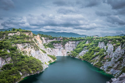 Landscape view of grand canyon in thailand. abandon old mine with pond inside.