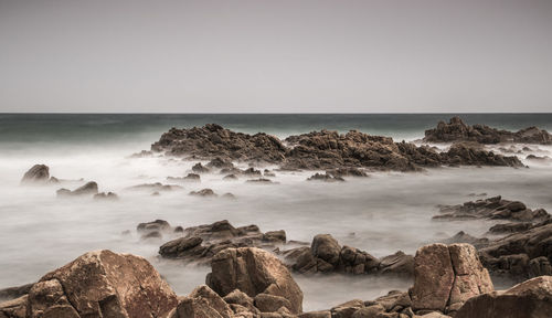 Scenic view of sea against clear sky