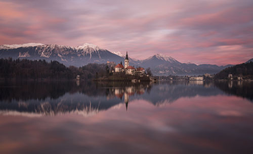 Scenic view of lake against sky during sunset