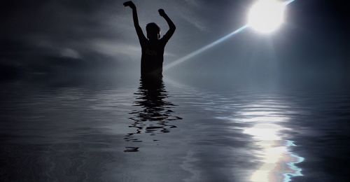 Woman jumping in sky