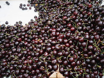 Close-up of black peppercorns on table