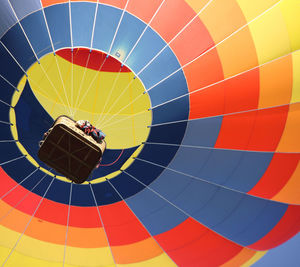 Low angle view of multi colored hot air balloon