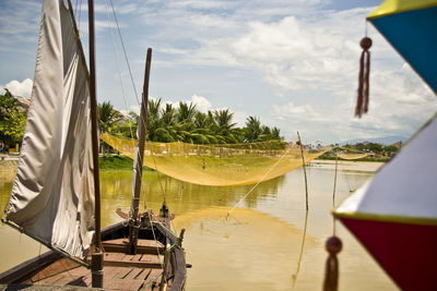 Net over river against sky