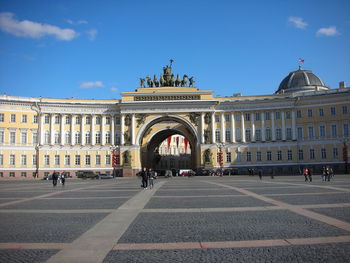 Group of people in front of historical building