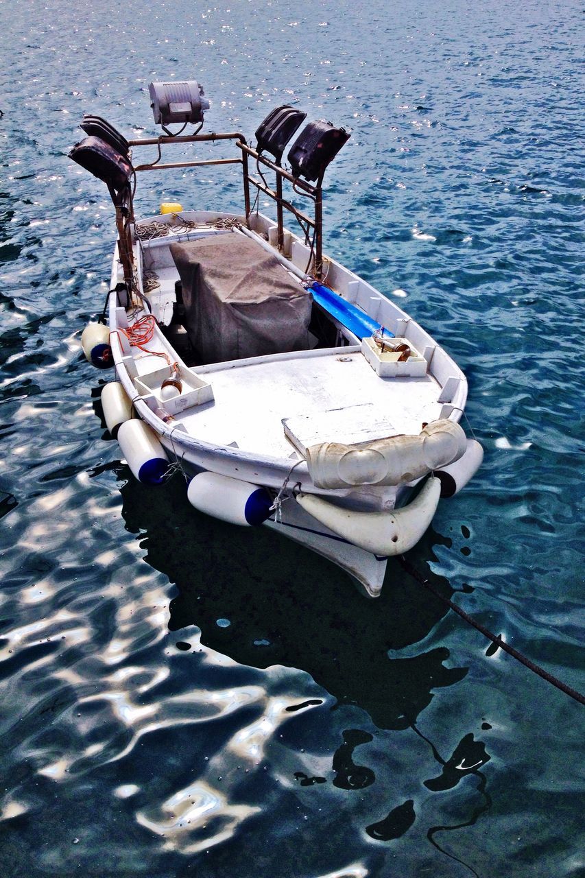 nautical vessel, boat, moored, transportation, water, mode of transport, sea, high angle view, day, rowboat, nature, abandoned, lake, outdoors, no people, rope, fishing industry, harbor, fishing boat, rippled