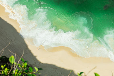 Aerial view of man standing on beach