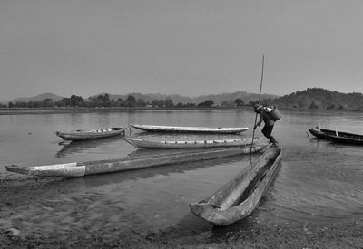 Boats moored in sea