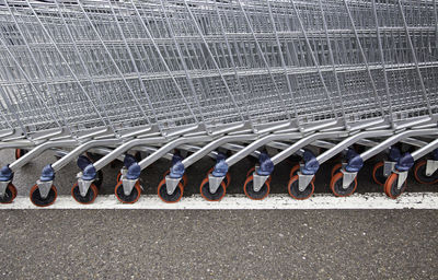 Close-up of shopping carts on road