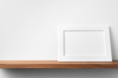 High angle view of white table against wall