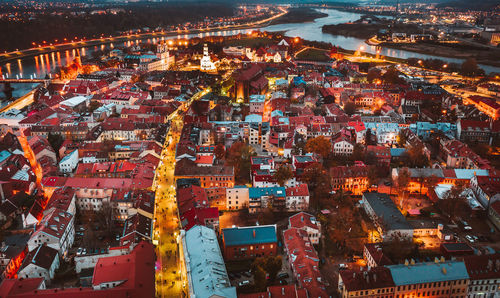 High angle view of illuminated buildings in city