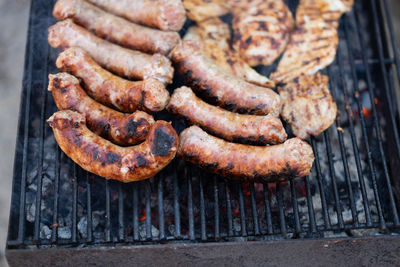 Close-up of meat on barbecue grill