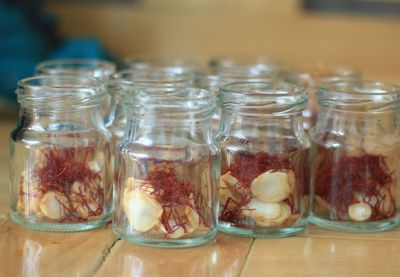 Close-up of fruits in glass jar on table