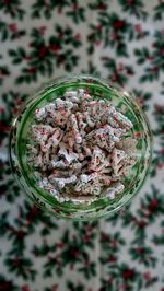 Directly above view of christmas tree shape candies in jar