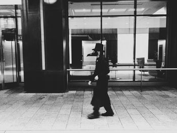 Full length of woman standing in city