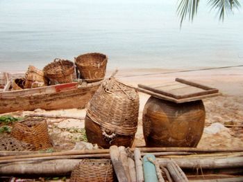 Wicker baskets and urns at beach