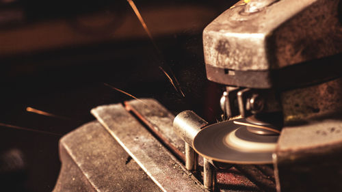 High angle view of old machine part on table