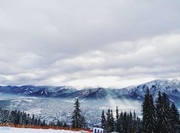 Scenic view of mountains against sky during winter