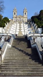 Low angle view of staircase of building against sky