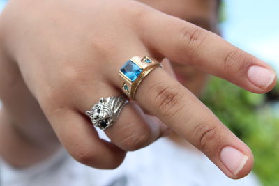 Woman wearing rings while gesturing