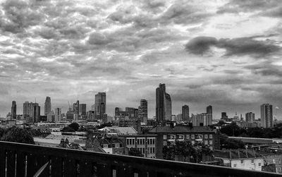 Modern buildings in city against sky