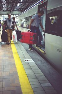 Low section of people at railroad station