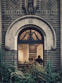 People in front of building