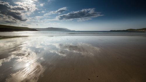 Scenic view of beach against sky