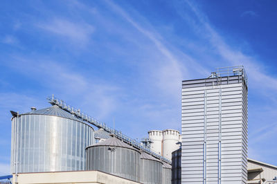 Low angle view of building against blue sky