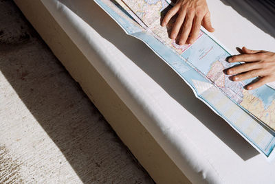 High angle view of person working on table