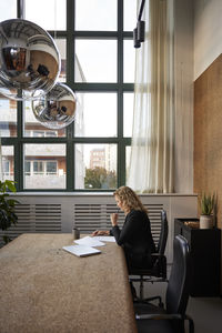 Cat sitting on floor at home
