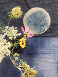 High angle view of flowers in vase on table